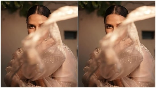 Neha teamed the saree with an ivory white blouse with turtleneck. The saree featured intricate work in white at the borders.(Instagram/@nehadhupia)