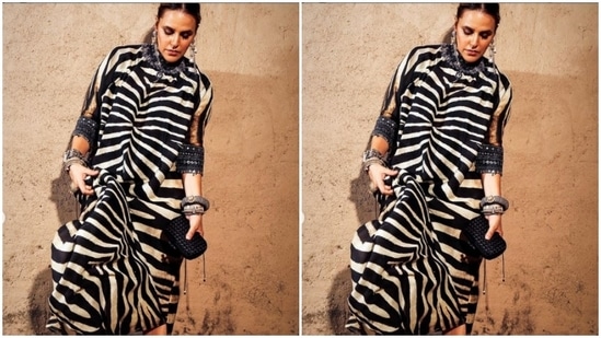 In statement oxidised earrings and bracelets, she perfectly accessorised her look.(Instagram/@nehadhupia)