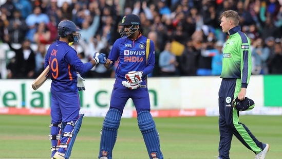 India's Dinesh Karthik and Deepak Hooda celebrate their win in the T20I cricket match vs Ireland.(AFP)