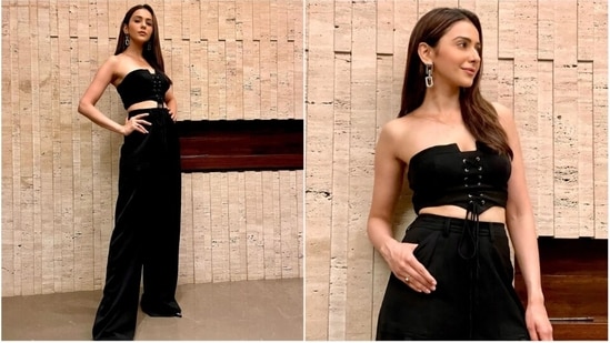 Rakul Preet's fashion game is always on point. From looking like a vision in chikankari kurtas to acing the glam red carpet look, the Runway 34 actor never misses an opportunity in impressing the fashion gods with her gorgeous fits. In her recent Instagram photos, Rakul can be seen rocking the casual look as she stepped out in a black co-ord set comprised of a bandeau top and long pants.(Instagram/@raulpreet)