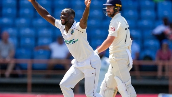 West Indies' Kemar Roach successfully appeals for the wicket of England's Jack Leach&nbsp;(AP)