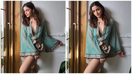 Looking for outfit ideas for a lunch date with your partner? This look of Alia Bhatt in a flared sleeve top - featuring intricate embroidery and a plunging neckline - paired with a lace bralette and brown-coloured shorts is a perfect option. She styled the look with slip-on sandals and earrings.(Instagram)