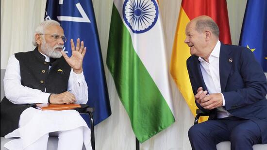German Chancellor Olaf Scholz in conversation with Prime Minister Narendra Modi during a meeting on the sidelines of the G7 Summit at Castle Elmau in Kruen, near Garmisch-Partenkirchen in Germany on Monday. (AP PHOTO.) German Chancellor Olaf Scholz in conversation with Prime Minister Narendra Modi during a meeting on the sidelines of the G7 Summit at Castle Elmau in Kruen, near Garmisch-Partenkirchen in Germany on Monday. (AP PHOTO.)