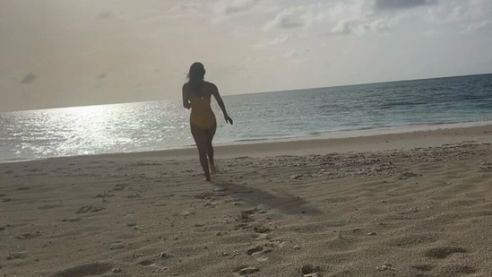 In another photo, Priyanka served fans with a Baywatch moment as she ran on the beach dressed in a monokini. She wore a yellow-coloured swimsuit for taking a dip in the sea.(Instagram)