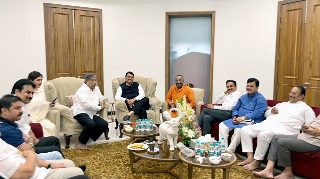 Leader of Opposition Devendra Fadnavis with BJP Maharashtra president Chandrakant Patil and party leaders during a meeting in Mumbai on Monday. (ANI)