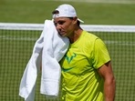 Spain's Rafael Nadal wipes his face with a towel as he practices ahead of the Wimbledon 2022(AP) Spain's Rafael Nadal wipes his face with a towel as he practices ahead of the Wimbledon 2022(AP)