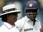 File photo of Asad Rauf (L) with MS Dhoni