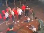 The protesting woman was dragged out of the restaurant — in a way considered most humiliating — by her hair; outside, the kicking and punching continued as she lay on the road crumpled like a piece of cloth. (@badiucao/Twitter)