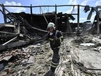 Rescuers clear rubbles of the Amstor mall in Kremenchuk. Rescuers clear rubbles of the Amstor mall in Kremenchuk.
