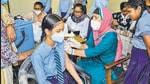 Jalandhar: A health worker administers a dose of COVID-19 vaccine to a student, amid rise in coronavirus cases, at a government school, in Jalandhar, Monday, May 2, 2022. (PTI Photo) (PTI05_02_2022_000108B) (PTI) Jalandhar: A health worker administers a dose of COVID-19 vaccine to a student, amid rise in coronavirus cases, at a government school, in Jalandhar, Monday, May 2, 2022. (PTI Photo) (PTI05_02_2022_000108B) (PTI)