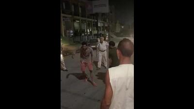 A clip of the incident in which sub inspector Balwinder Singh fires at a civilian in Dera Bassi town of Mohali district on Sunday night. (HT Pjptp) A clip of the incident in which sub inspector Balwinder Singh fires at a civilian in Dera Bassi town of Mohali district on Sunday night. (HT Pjptp)