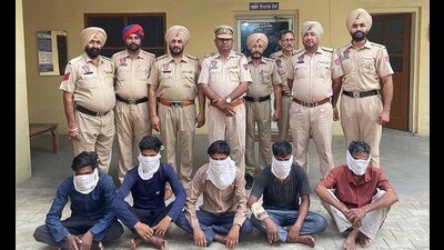 The accused in custody of Sahnewal police in Ludhiana on Tuesday. (HT Photo)