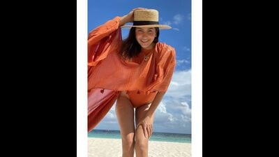 Anushka Sharma rocking an orange monokini with a matching cover-up from Flirtatious (Instagram) Anushka Sharma rocking an orange monokini with a matching cover-up from Flirtatious (Instagram)