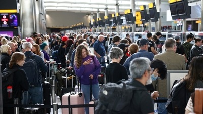 Passengers queue inside the departures terminal of Terminal 2 at Heathrow Airport in London, Britain&nbsp; (REUTERS/Henry Nicholls)