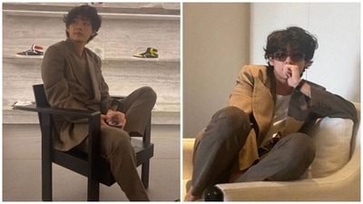 Earlier, V dropped pictures of himself chilling in a park, watching a basketball game, and visiting Celine's store in Paris. The photos showed him dressed in a dark brown suit set. It features a double-breasted blazer with notch lapels, long sleeves, oversized fitting and an open front. (Instagram/@thv) Earlier, V dropped pictures of himself chilling in a park, watching a basketball game, and visiting Celine's store in Paris. The photos showed him dressed in a dark brown suit set. It features a double-breasted blazer with notch lapels, long sleeves, oversized fitting and an open front. (Instagram/@thv)