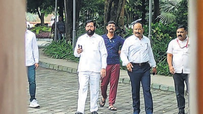 Guwahati: Rebel Shiv Sena leader Eknath Shinde arrives to address media at a hotel where he is staying with other supporting MLAs, in Guwahati, Tuesday, June 28, 2022. (PTI Photo)(PTI06_28_2022_000070B) (PTI) Guwahati: Rebel Shiv Sena leader Eknath Shinde arrives to address media at a hotel where he is staying with other supporting MLAs, in Guwahati, Tuesday, June 28, 2022. (PTI Photo)(PTI06_28_2022_000070B) (PTI)