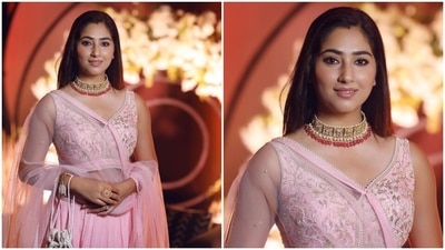 In the end, Disha styled her look with a heavy gold-toned choker necklace featuring flamingo-pink gems and white beads, statement rings, matching heels and an embellished potli bag. Open tresses, sleek eyeliner, glowing skin, blushed cheeks, mascara on the lashes and nude lip shade completed the glam picks. (Instagram)