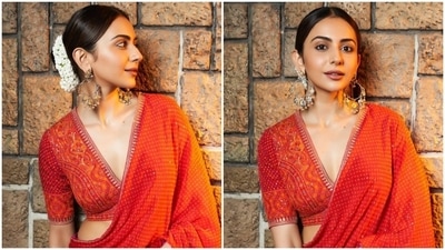 Sarees are a staple in every fashion lover's wardrobe as the timeless six yards can never go out of fashion. Even your favourite Bollywood fashionistas love wearing this classic number. Rakul Preet Singh, who has displayed her sartorial prowess several times, in the past, in different silhouettes, confessed her love for the six yards by dropping stunning pictures of herself in a Bandhani drape and a regal blouse. Her gorgeous look will definitely sweep you off your feet. Scroll ahead to check it out. (Instagram) Sarees are a staple in every fashion lover's wardrobe as the timeless six yards can never go out of fashion. Even your favourite Bollywood fashionistas love wearing this classic number. Rakul Preet Singh, who has displayed her sartorial prowess several times, in the past, in different silhouettes, confessed her love for the six yards by dropping stunning pictures of herself in a Bandhani drape and a regal blouse. Her gorgeous look will definitely sweep you off your feet. Scroll ahead to check it out. (Instagram)