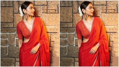 Lastly, Rakul styled the six yards with silver strappy pumps, an oxidised silver bracelet, and embellished hoop earrings. A centre-parted sleek bun, glossy nude lip shade, light mascara on the lashes, beaming highlighter, blushed cheeks, and sleek eyeliner completed the glam picks. What do you think of Rakul's regal avatar? (Instagram) Lastly, Rakul styled the six yards with silver strappy pumps, an oxidised silver bracelet, and embellished hoop earrings. A centre-parted sleek bun, glossy nude lip shade, light mascara on the lashes, beaming highlighter, blushed cheeks, and sleek eyeliner completed the glam picks. What do you think of Rakul's regal avatar? (Instagram)