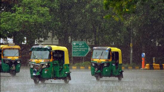 Autos commute amid heavy rainfall in New Delhi. (ANI Photo) Autos commute amid heavy rainfall in New Delhi. (ANI Photo)
