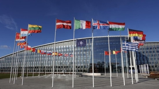 Flags flutter in the wind outside Nato headquarters in Brussels, Belgium. (AP)