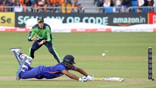 Sanju Samson avoids a run-out during the second T20I between Ireland and India at Malahide cricket club in Dublin(AFP)