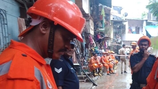 NDRF officials at the site of the incident in Kurla, Mumbai.(ANI)