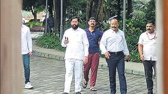 Guwahati: Rebel Shiv Sena leader Eknath Shinde arrives to address media at a hotel where he is staying with other supporting MLAs, in Guwahati, Tuesday, June 28, 2022. (PTI Photo)(PTI06_28_2022_000070B) (PTI) Guwahati: Rebel Shiv Sena leader Eknath Shinde arrives to address media at a hotel where he is staying with other supporting MLAs, in Guwahati, Tuesday, June 28, 2022. (PTI Photo)(PTI06_28_2022_000070B) (PTI)