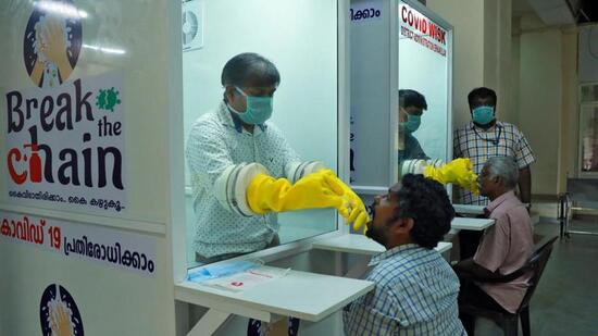 Health workers collect swab samples from people to test for coronavirus infection in Ernakulam, Kerala. (REUTERS File Photo)