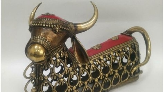 PM Modi gifted Nandi-themed Dokra Art to Argentina's president Alberto Fernandez. Dokra Art is non-ferrous metal casting art that is made using the lost-wax casting technique. The piece of art is made in Chhattisgarh, India.(ANI)