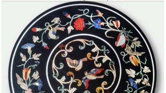 PM Modi gifted a marble inlay table top to Italy's prime minister Mario Draghi. The marble top has its origin in Agra. (ANI)