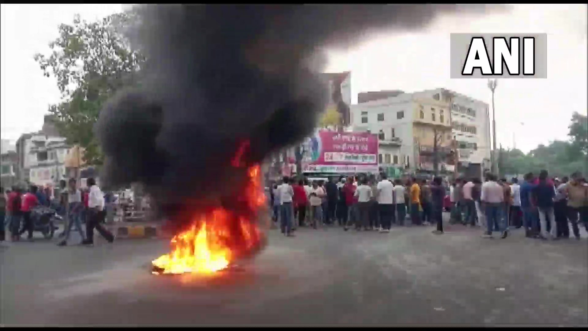 Locals stage a protest over the murder. (ANI Twitter) Locals stage a protest over the murder. (ANI Twitter)