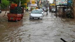 A water-logged street at Nayagaon in Chandigarh after the showers on Wednesday morning. (Keshav Singh/HT)