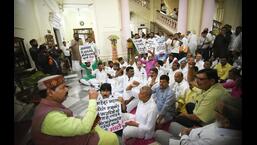 Opposition legislators demonstrate in front of the chamber of Bihar Assembly speaker Vijay Kumar Sinha on Wednesday. (Santosh Kumar/HT Photo) Opposition legislators demonstrate in front of the chamber of Bihar Assembly speaker Vijay Kumar Sinha on Wednesday. (Santosh Kumar/HT Photo)