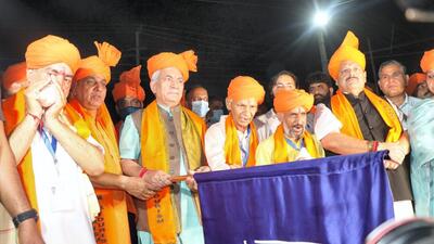 Jammu and Kashmir Lt governor Manoj Sinha flags off the first batch of pilgrims for the Amarnath Yatra 2022 after conducting a puja at the Bhagwati Nagar base camp in Jammu, on Wednesday. (PTI) Jammu and Kashmir Lt governor Manoj Sinha flags off the first batch of pilgrims for the Amarnath Yatra 2022 after conducting a puja at the Bhagwati Nagar base camp in Jammu, on Wednesday. (PTI)