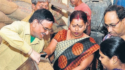 Under the new system, a family of four will get 20 kg more of rice instead of wheat. (HT file) Under the new system, a family of four will get 20 kg more of rice instead of wheat. (HT file)