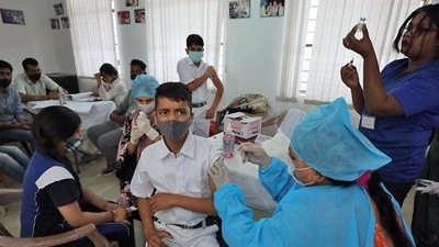 A student reacts while receiving a dose of the COVID-19 vaccine during a vaccination drive, in Jammu. (ANI) A student reacts while receiving a dose of the COVID-19 vaccine during a vaccination drive, in Jammu. (ANI)
