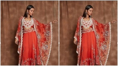 Shibani teamed a red bra that came intricately decorated in white and golden zari with a long red skirt that featured details in moti. (Instagram/@shibanidandekarakhtar)