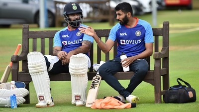 Jasprit Bumrah talks to Hanuma Vihari as they a break at nets ahead of the 5th Test between England and India at Edgbaston in Birmingham (AP)
