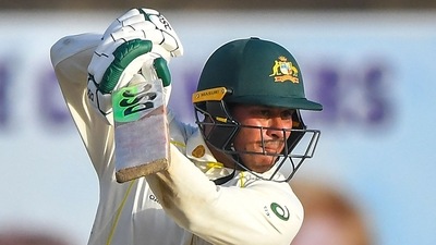 Usman Khawaja plays a shot during the first day of the first cricket Test match between Sri Lanka and Australia. (AFP) Usman Khawaja plays a shot during the first day of the first cricket Test match between Sri Lanka and Australia. (AFP)