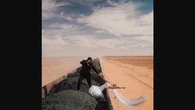 The image shows the influencer couple who took their honeymoon pics atop a freight train and posted them on Instagram. (Instagram/@kristijanilicic)