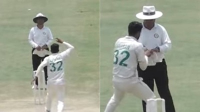 Hasan Ali forcefully tries to raise umpire's finger (YouTube grab) Hasan Ali forcefully tries to raise umpire's finger (YouTube grab)