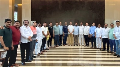 Eknath Shinde with other rebel Shiv Sena MLAs at a hotel in Guwahati (PTI) (PTI)