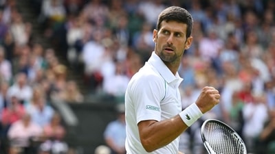Novak Djokovic celebrates beating Thanasi Kokkinakis during their men's singles tennis match on the third day of the 2022 Wimbledon Championships. (AFP) Novak Djokovic celebrates beating Thanasi Kokkinakis during their men's singles tennis match on the third day of the 2022 Wimbledon Championships. (AFP)