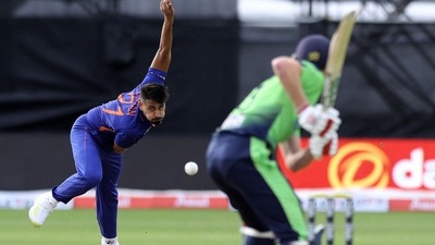 Umran Malik bowls during the 2nd T20I between Ireland and India at Malahide cricket club, in Dublin. (AFP) Umran Malik bowls during the 2nd T20I between Ireland and India at Malahide cricket club, in Dublin. (AFP)