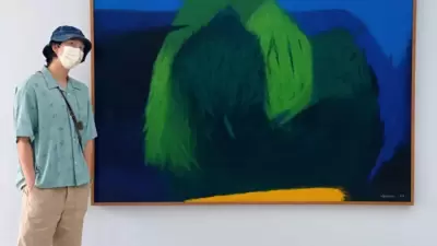BTS: RM poses with an art piece. BTS: RM poses with an art piece.