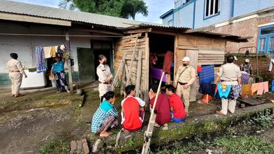 Police with the Myanmar citizens apprehended in Manipur. (HT Photo (local sources)) Police with the Myanmar citizens apprehended in Manipur. (HT Photo (local sources))