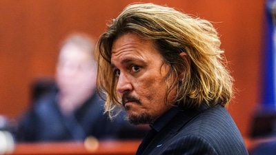 US actor Johnny Depp in court during the $50 million Depp vs Heard defamation trial last month. He has been spotted at Paris airport in a new look. (AFP) US actor Johnny Depp in court during the $50 million Depp vs Heard defamation trial last month. He has been spotted at Paris airport in a new look. (AFP)