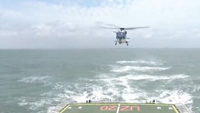 ICG chief flies ALH Mark 3 helicopter, lands on warship in Arabian Sea (ANI)