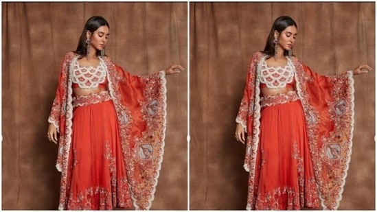 Shibani teamed a red bra that came intricately decorated in white and golden zari with a long red skirt that featured details in moti.(Instagram/@shibanidandekarakhtar)